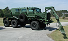 LAND_Buffalo_in_Green_Claw_Displayed.jpg
