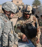 MIL_US_and_Iraqi_Soldier_Planning.jpg